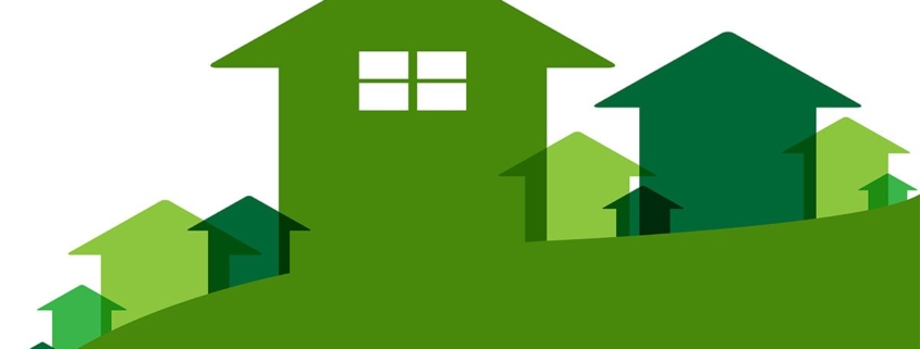 Collage aus gemalten Häusern in verschiedenen Grüntönen - Immobilienbau