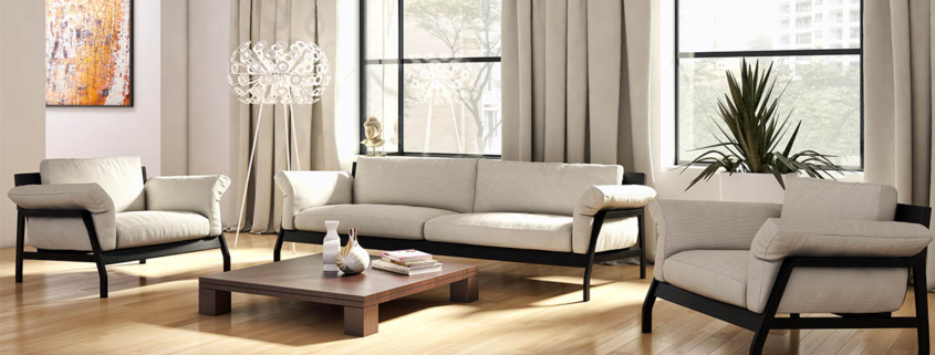 Ein Wohnzimmer mit hellgrauer Einrichtung - Was Homestaging bewirkt