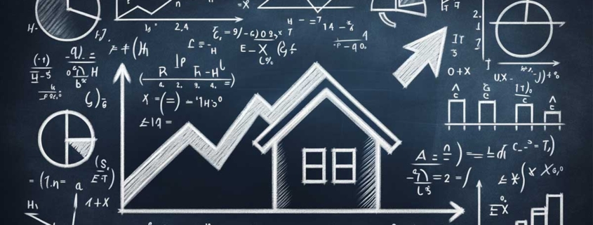 eine Tafel an die Aktienkurse, Graphen und ein Haus gemalt sind